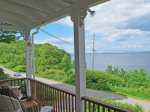 The cottages sits with open views of Penobscot Bay and Islesboro - The quiet Shore Road passes between the cottage and the ocean